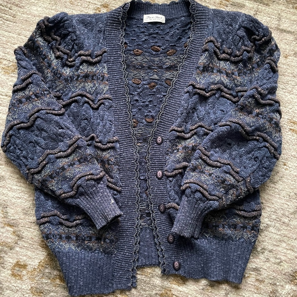 Two Two Knit Oversized Cardigan with puffy shoulders.